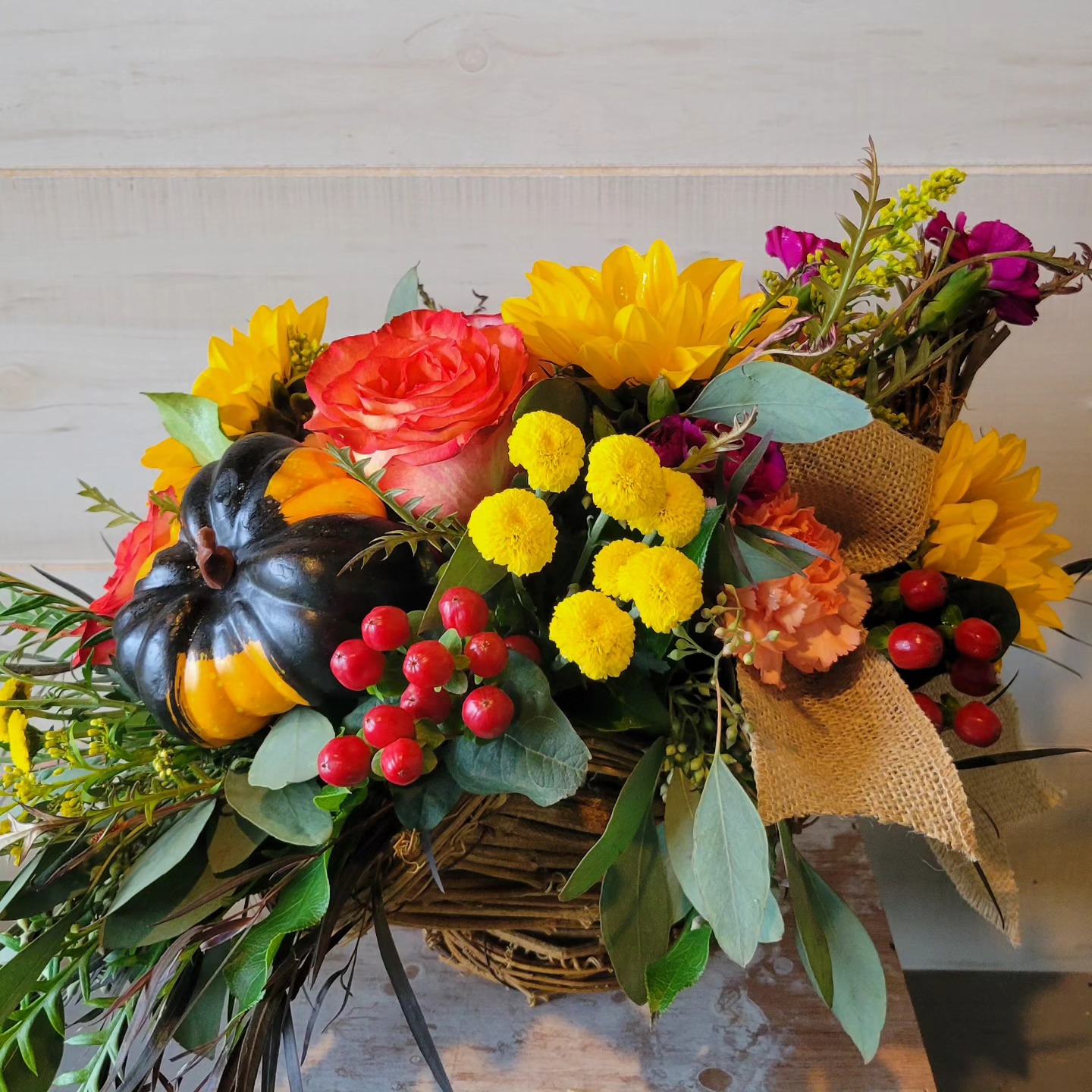 fall flower arrangement in basket