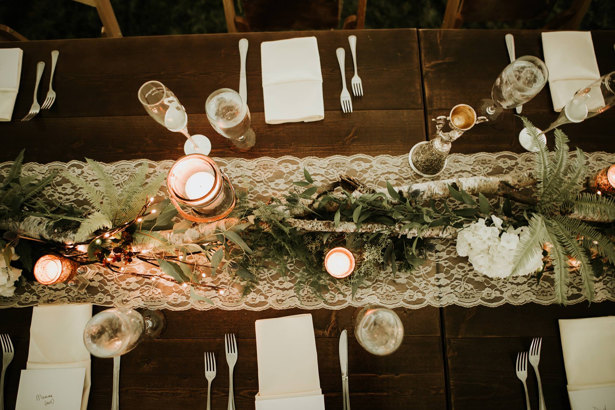 lace table runner with greenery for wedding reception