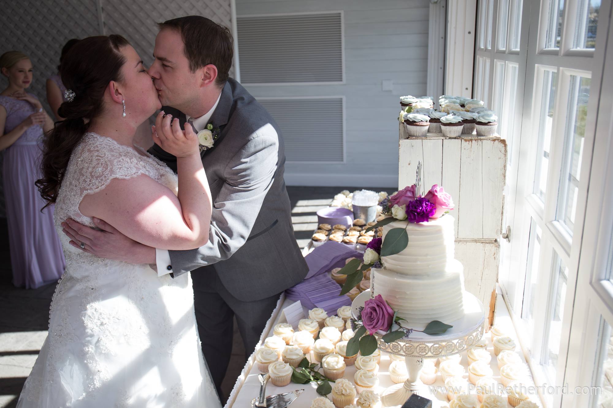 bride and groom kissing