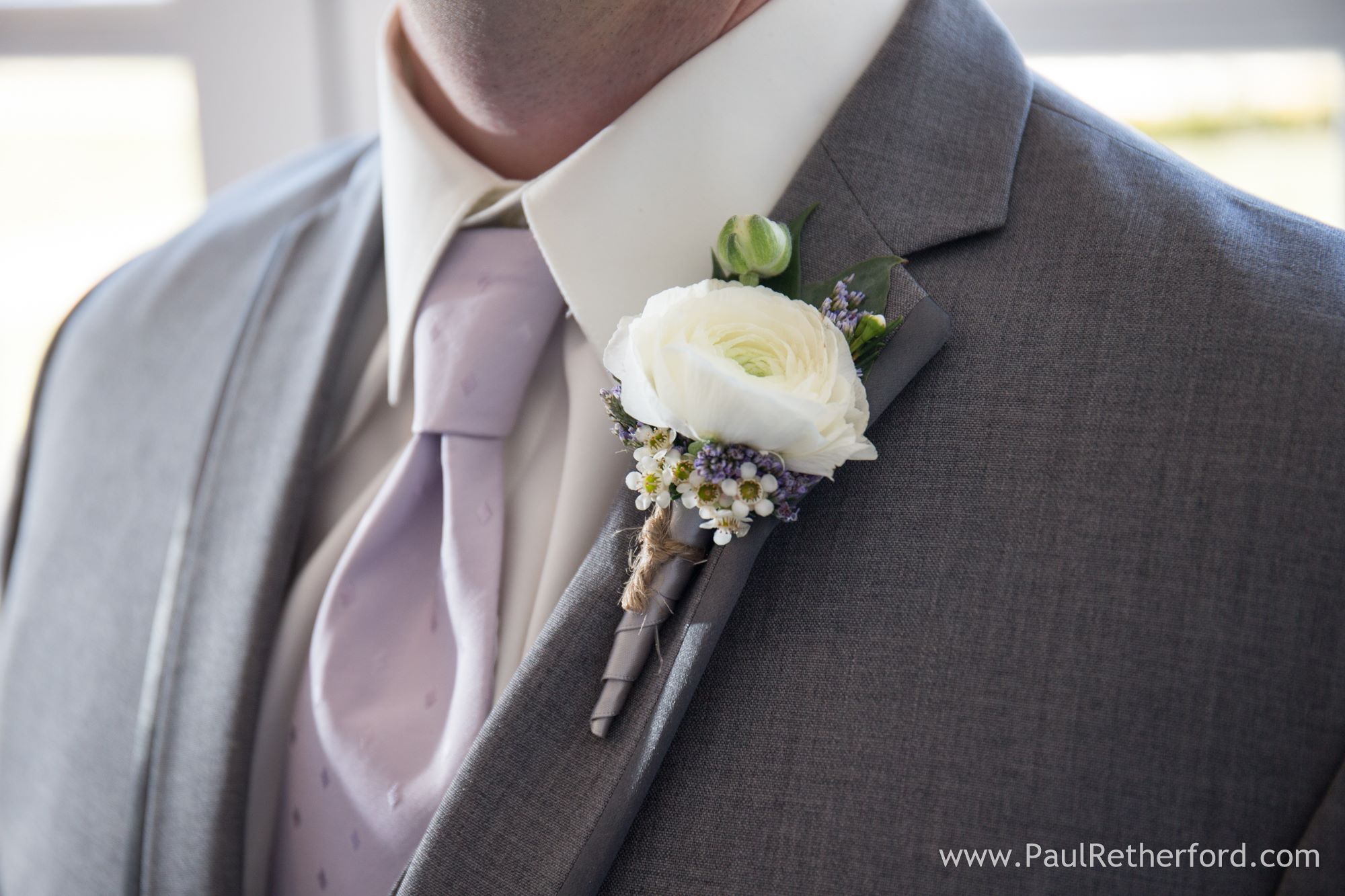 white peony boutonniere