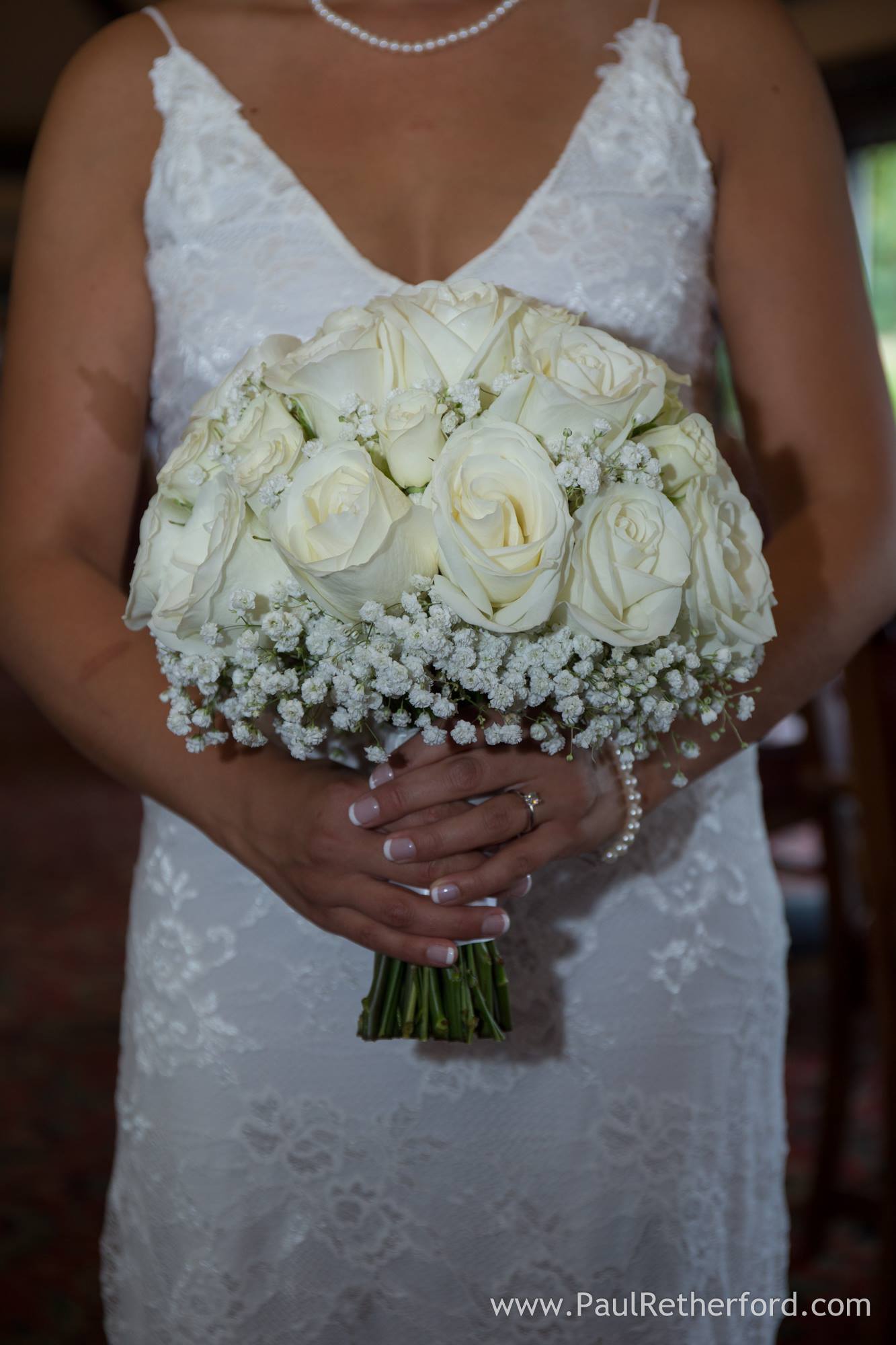white rose and babys breath bouquet